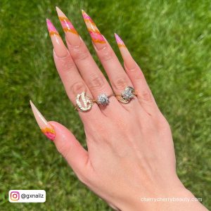 Pink And Orange Marble Nails In Stiletto Shape