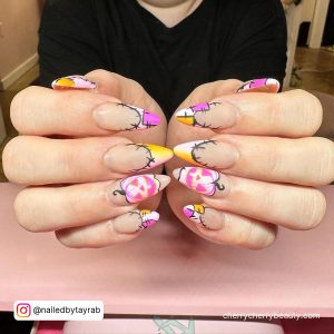 Pink And Orange Nail Ideas With Black Stitches For Halloween