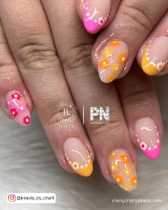 Pink And Orange Nails With Flowers