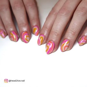 Pink And Orange Swirl Nails In Almond Shape