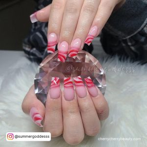 Pink And Red Christmas Nails With Swirls On Tips