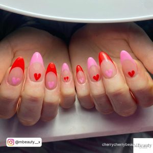 Pink And Red Heart Nails In Almond Shape