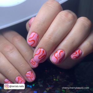 Pink And Red Swirl Nails