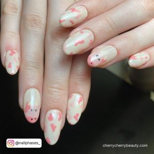 Pink And White Cow Print Nails In Almond Shape