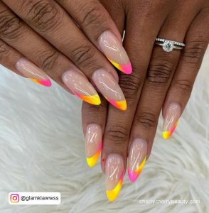 Pink And Yellow Acrylic Nails In Stilleto Shape