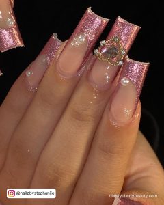 Pink Chrome And Glitter Nails With Rhinestones