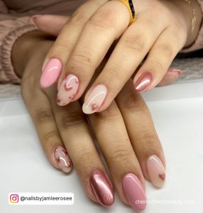 Pink Chrome Glitter Nails With Hearts