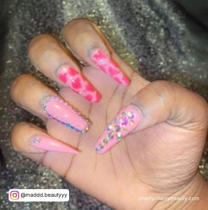 Pink Cow Print Nails With Embellishments