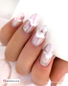 Pink Marble Nail Design In Almond Shape