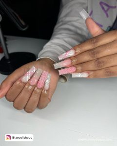 Pink Nails For Christmas With Snowflakes