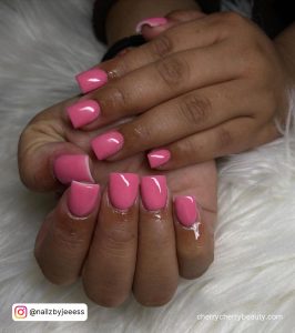 Pink Nails Short Square On A White Furry Surface