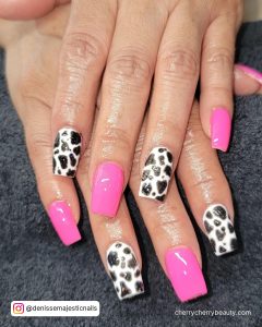 Pink Nails With Cow Print With Few Nails In Black And White