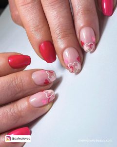 Pink Nails With Heart Design In Almond Shape