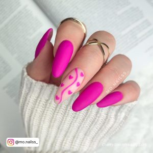 Pink Nails With Little Heart In Almond Shape
