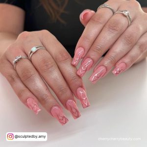 Pink With Chrome Nails With Swirls