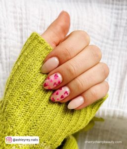 Pink With Hearts Nails In Almond Shape
