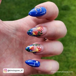 Pretty Almond Acrylic Nail Ideas With Mushrooms And Stars