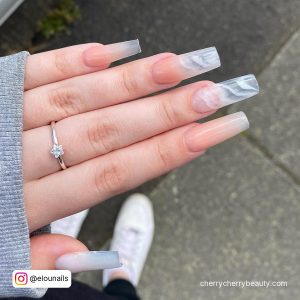Pretty Long Simple Acrylic Nails With Ombre And Clear Design With Floor In Background )