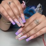 Purple Acrylic Nails With Embellishments