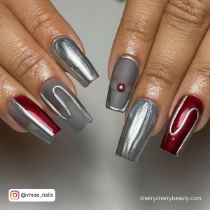 Red And Silver Chrome Nails With Swirls