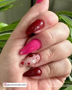 Red Nails Pink Heart In Stiletto Shape