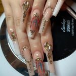 Rose Gold Acrylic Nails With Rhinestones