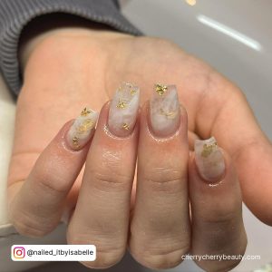 Rose Gold Marble Acrylic Nails In Square Shape