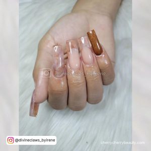 Shades Of Brown Acrylic Nails In Coffin Shape