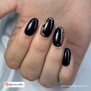 Short Black And Gold Nails In Almond Shape