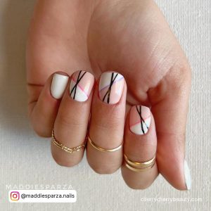Short Pink And White Nails With Black Line Design