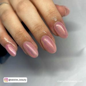 Short Pink Chrome Nails In Almond Shape