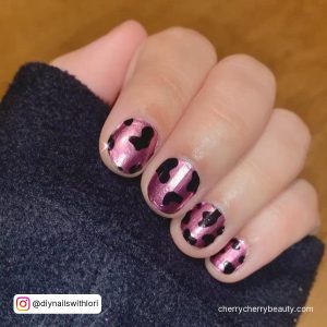 Short Pink Cow Print Nails With A Shiny Texture