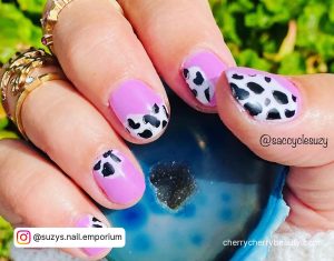 Short Pink Cow Print Nails With Black Spots