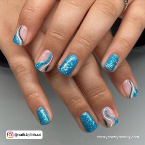 Short Sparkly Blue Winter Acrylic Nails