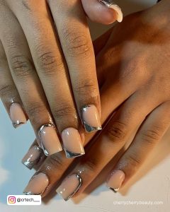 Silver Chrome Nail Paint On Tips With Nude Base Coat