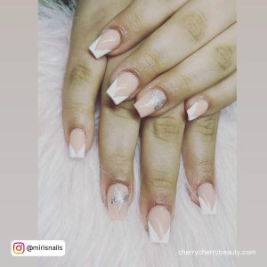 Simple Butterfly Acrylic Nails With White Tips Laying On White Fur