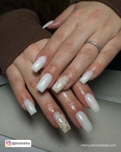 Simple Christmas Design For Acrylic Nails With Gold Flakes Over White Surface