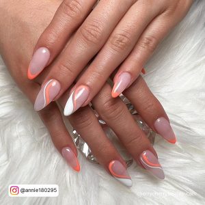 Simple Elegant Acrylic Nails With Swirly Design Over White Fur