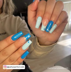 Simple Lift Blue Acrylic Nails With Hearts And Lady In Background