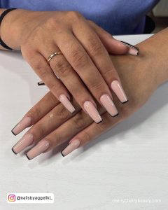 Simple Thin French Tip Acrylic Nail Over White Surface