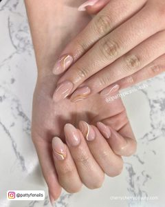 Swirly Simple Almond Acrylic Nails On Marble Surface