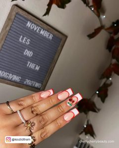 Valentine French Acrylic Nail Designs With Cherry And Room Decor In Background
