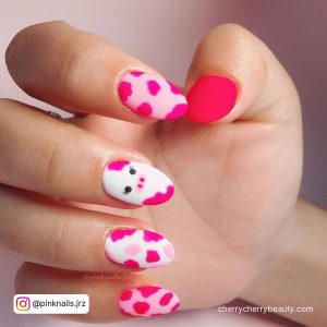 White And Pink Cow Print Nails In Almond Shape