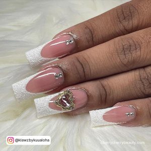 White Glitter French Tip Acrylic Nails With Stones And Gems Over White Fur