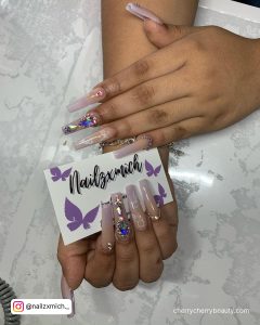 White Nails With Butterfly Design