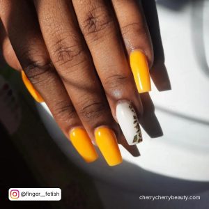 Yellow And White Acrylic Nails In Square Shape