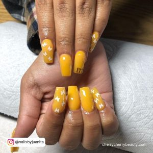 Yellow Nails With White Butterfly Nail Designs