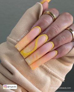 Yellow Ombre Acrylic Nails With Swirls