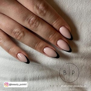 Almond Shaped Black French Tip Almond Nails With Bude Base Coat