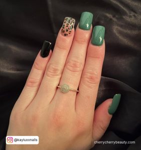 Army Green And Black Nails With Marble Design